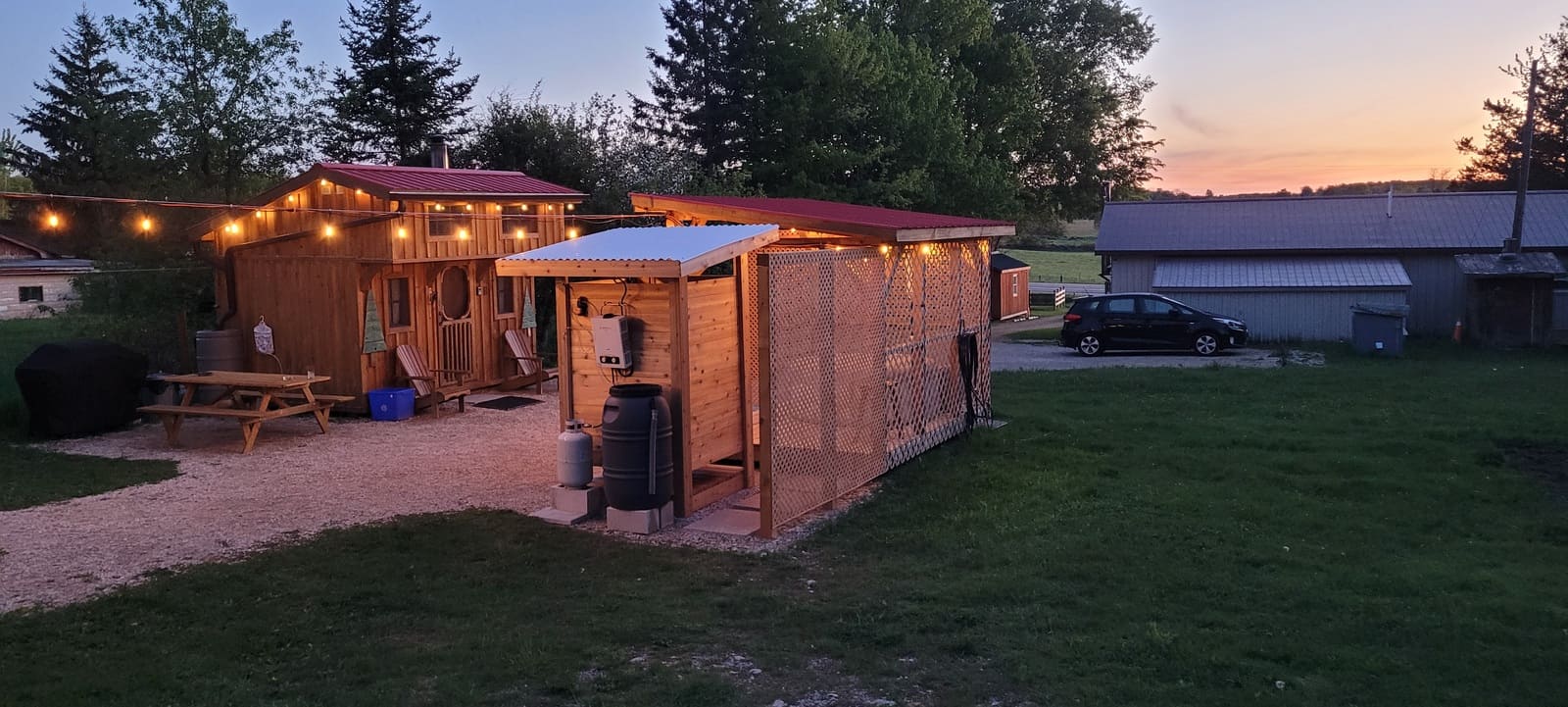 Exterior shower at tiny home rental in Williamsford Grey County